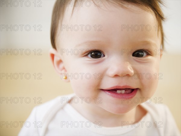 Mixed race baby smiling