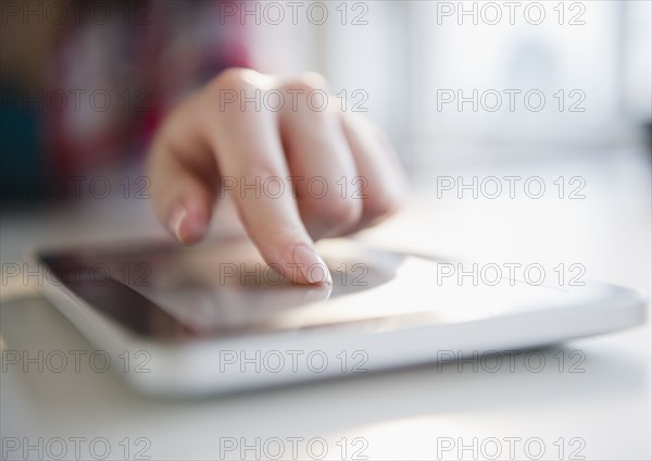 Korean woman using digital tablet