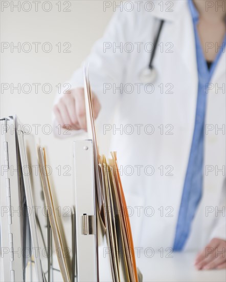 Korean doctor removing file folder