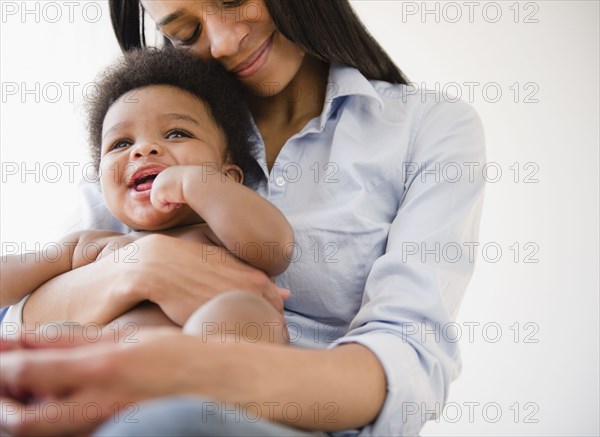 African American mother holding baby boy