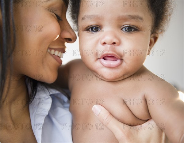 African American mother holding baby boy