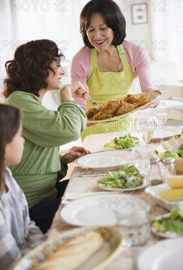 Family eating dinner together