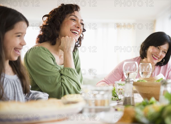 Family eating dinner together