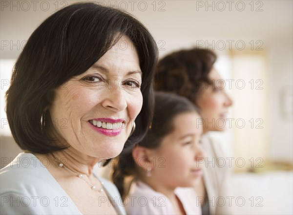 Smiling woman with family