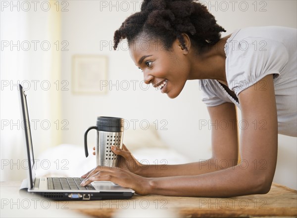 Black woman using laptop