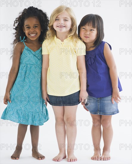 Smiling girls standing together