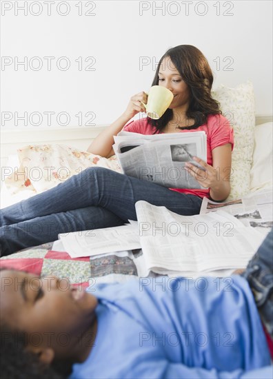 African American mother and son relaxing together