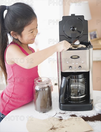 Korean girl making coffee