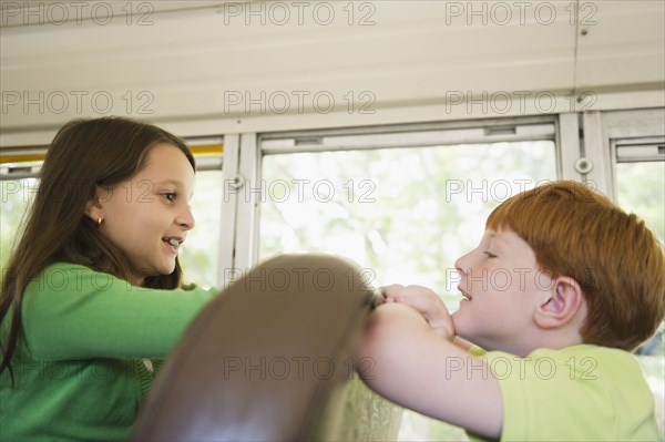 Children riding school bus