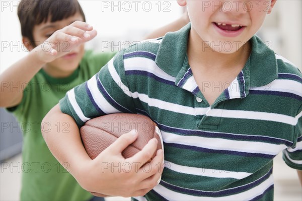 Boys playing football