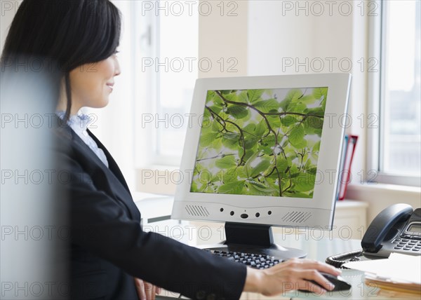 Japanese businesswoman using computer