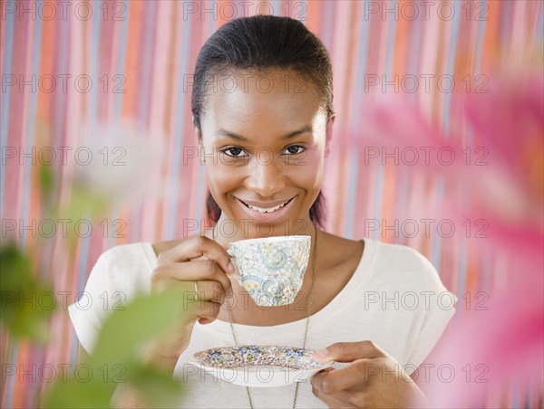 Black woman drinking tea