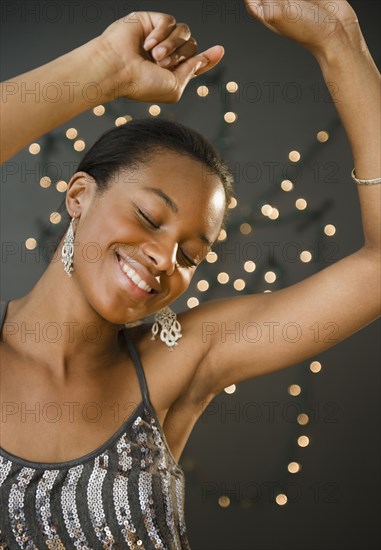 Glamorous Black woman dancing