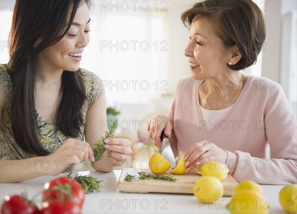 Japanese mother and daughter cooking together