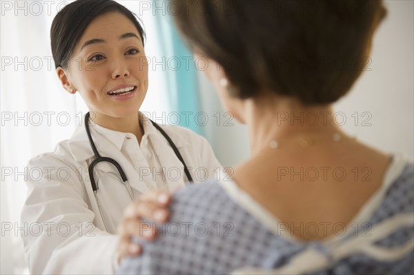 Japanese doctor talking to patient