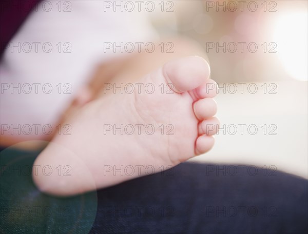 Close up of mixed race baby's foot