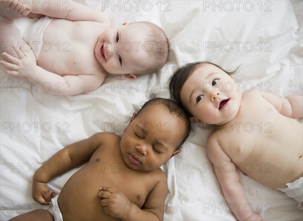 Babies laying on blanket