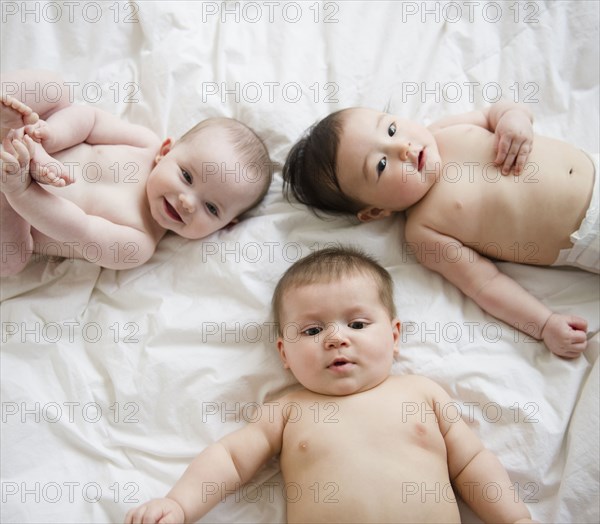 Babies laying on blanket