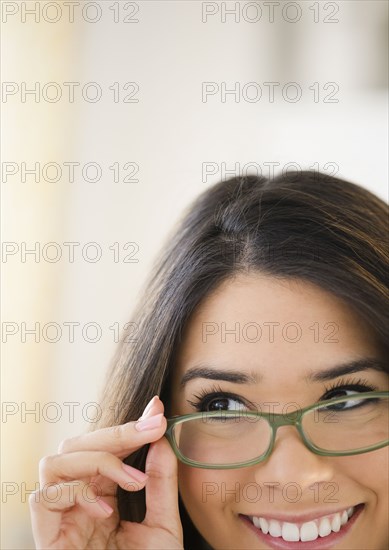 Hispanic woman wearing eyeglasses