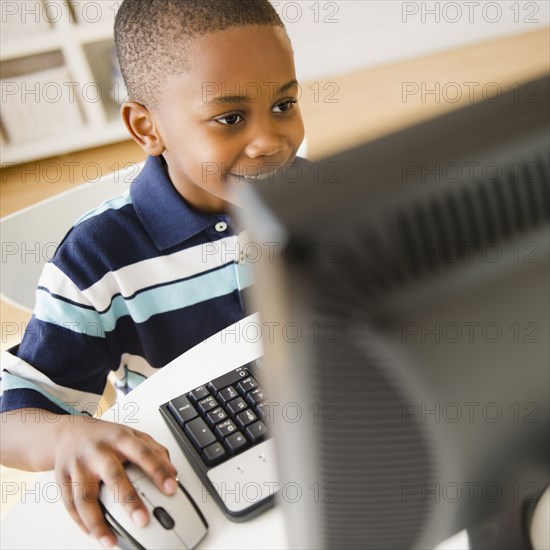 Black boy using computer