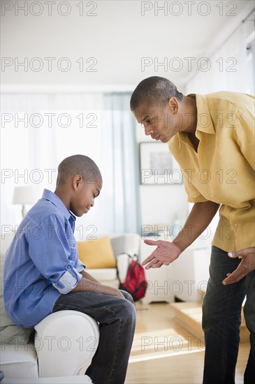 Father lecturing son