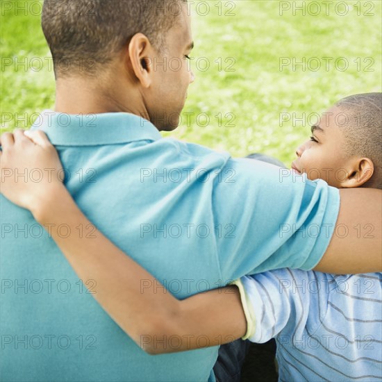 Father and son hugging