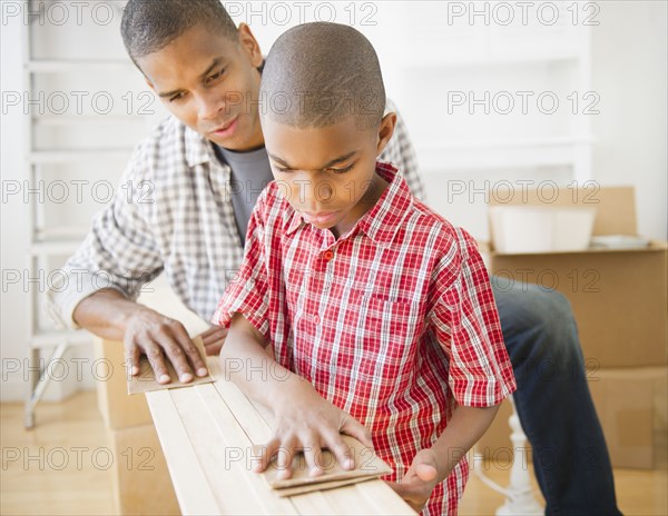 Father and son woodworking together