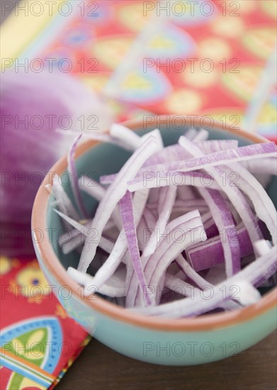 Chopped red onion in bowl