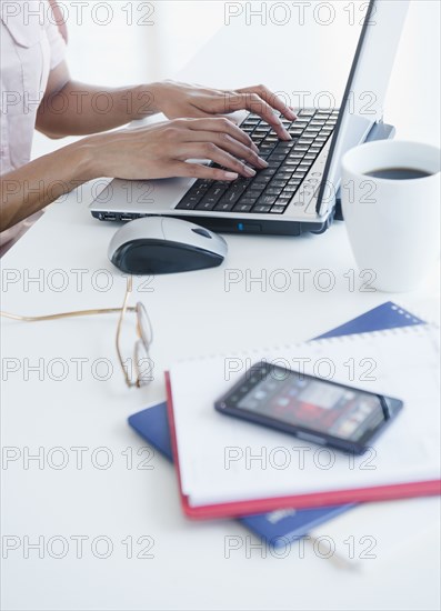 Cape Verdean woman using laptop