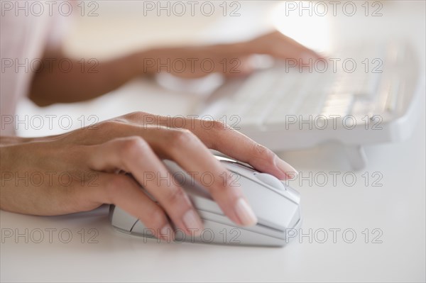 Cape Verdean woman using computer