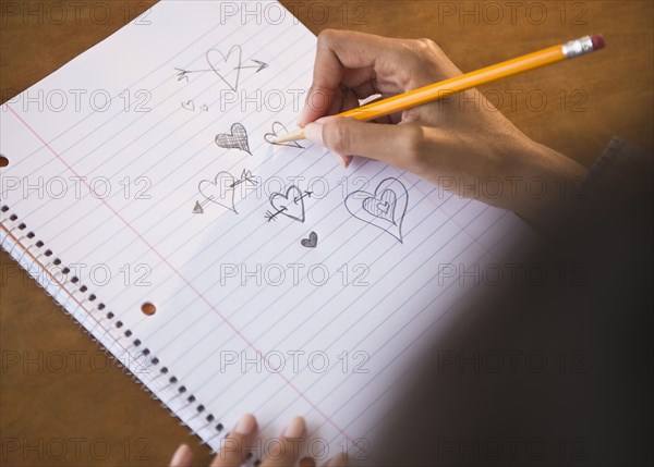 Cape Verdean woman doodling hearts