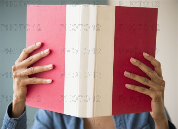 Cape Verdean woman reading a book