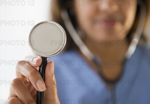 Cape Verdean doctor holding stethoscope