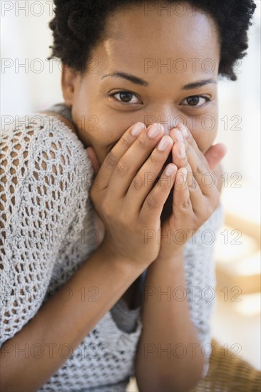 African American woman with obscured face