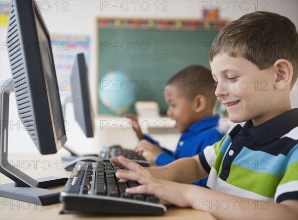 Students using computers in classroom