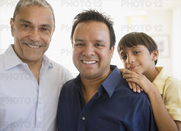 Smiling Hispanic grandfather