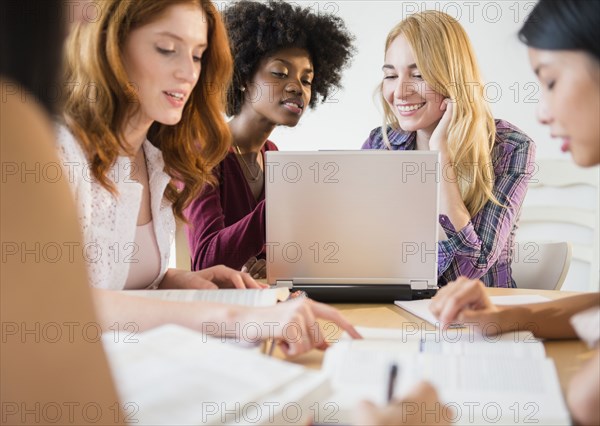 Businesswomen working together in meeting