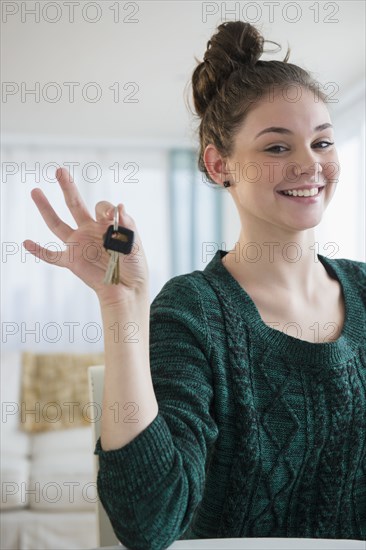 Hispanic girl holding car keys