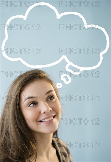 Hispanic girl with thought bubble