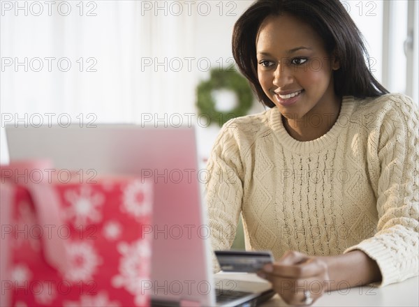 African American woman shopping online