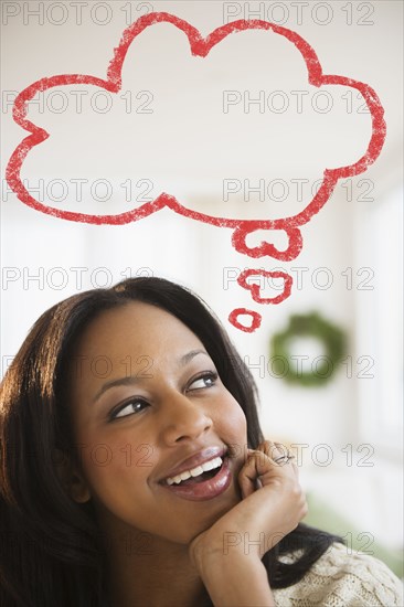 African American woman with thought bubble