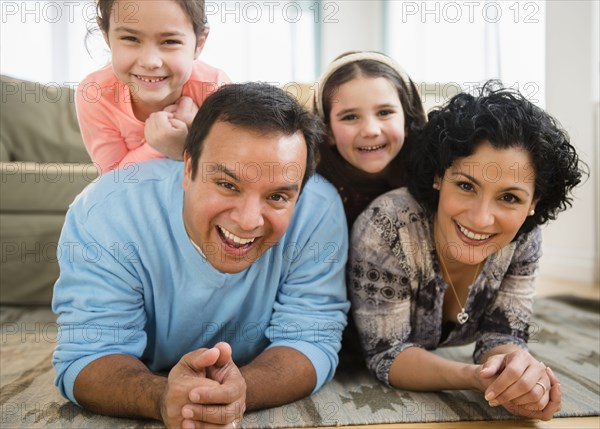 Family relaxing together in living room