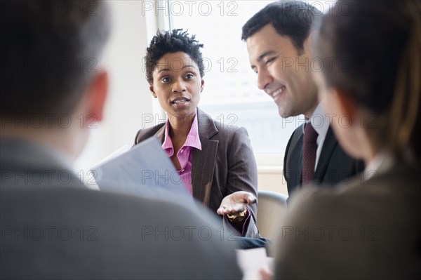 Business people talking in meeting