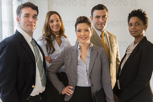 Business people smiling together in office