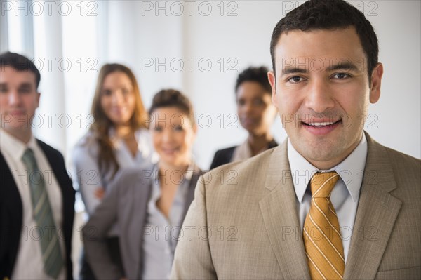 Businessman smiling in office