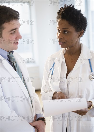 Doctors talking in office