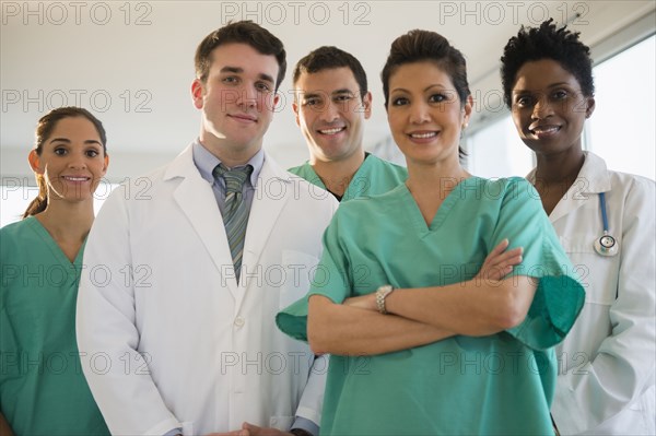 Nurses and doctors smiling in hospital