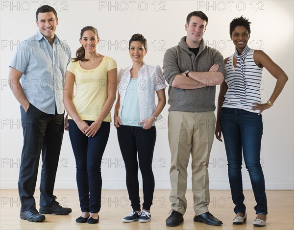 Friends smiling together indoors