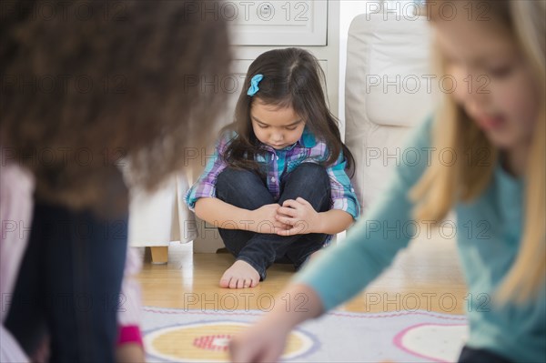 Girls playing without friend in living room