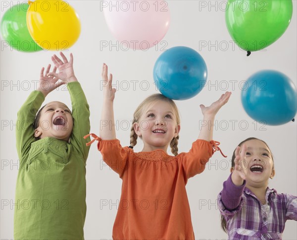 Girls playing with balloons